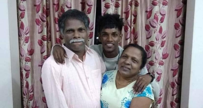 Saviour Gama and his parents